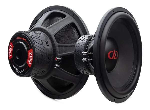 Photo of two 515e subs - one facing forward angled right to show most of motor, surround, cone and DD logo on dust cap, the other is back to front to show backplate with sticker reading "DD AUDIO 700 Watts RMS, 500 Series 515e-D4"