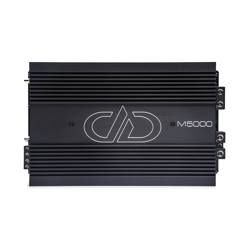 M Series 5000 Watt Monoblock Amplifier - Photo of amp on its side showing top plate, logo, model number