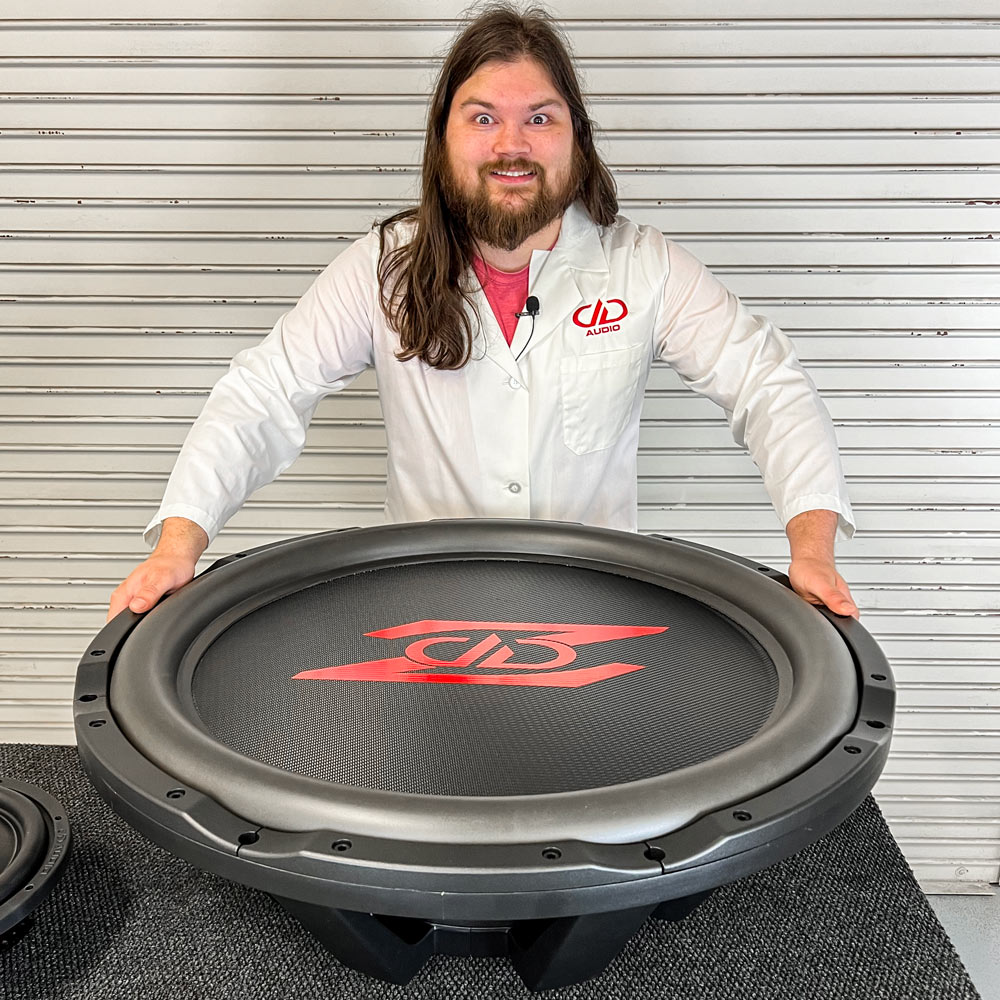 SLZ432 - photo of Blake with 32 inch subwoofer to give scale