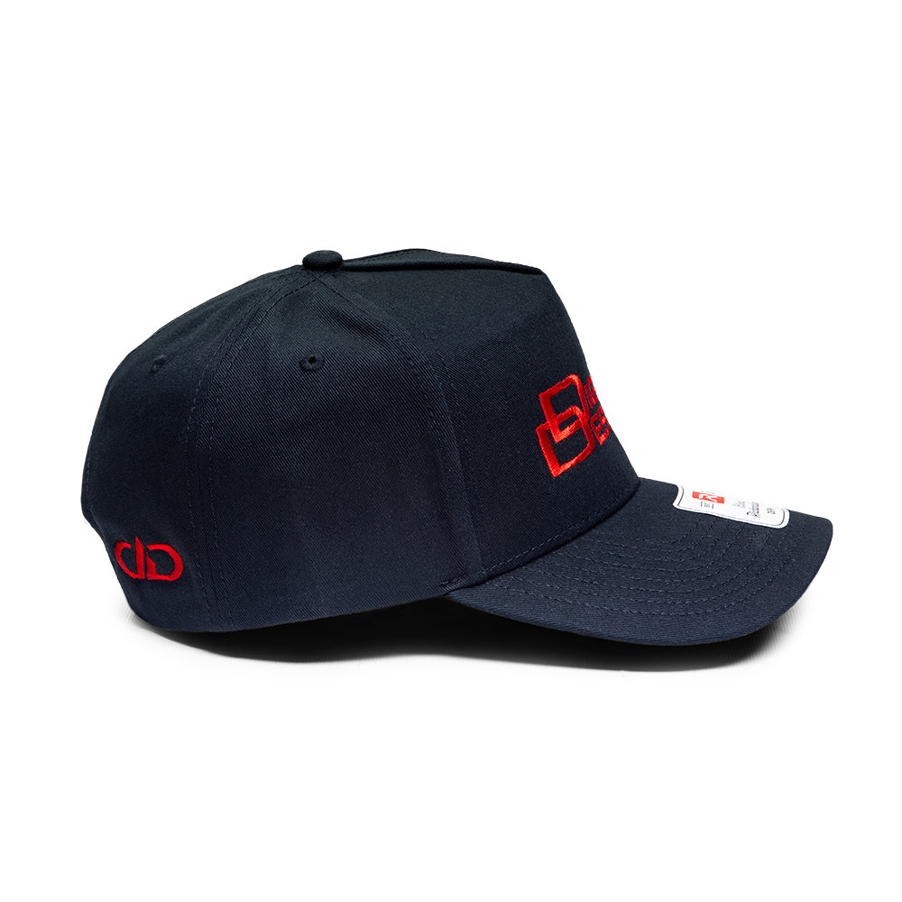 Digital Designs 40th Anniversary Hats - Profile shot of black hat with all red stitching showing right side with modern DD mark on back and Digital Designs logo on front and removable Richardson Hat sticker on front