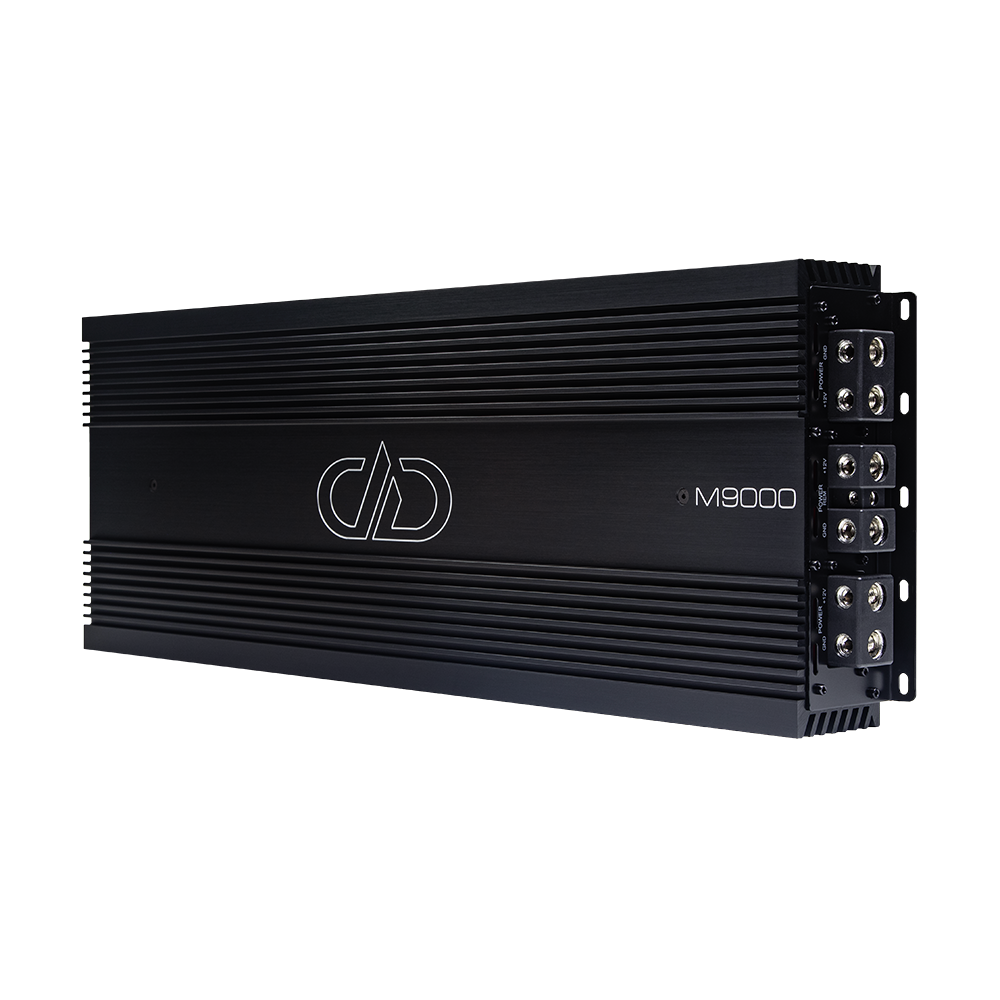 M Series 9000 Watt Monoblock Amplifier - Photo of M9000 angled to show full top plate with logo and model number as well as connection side panel